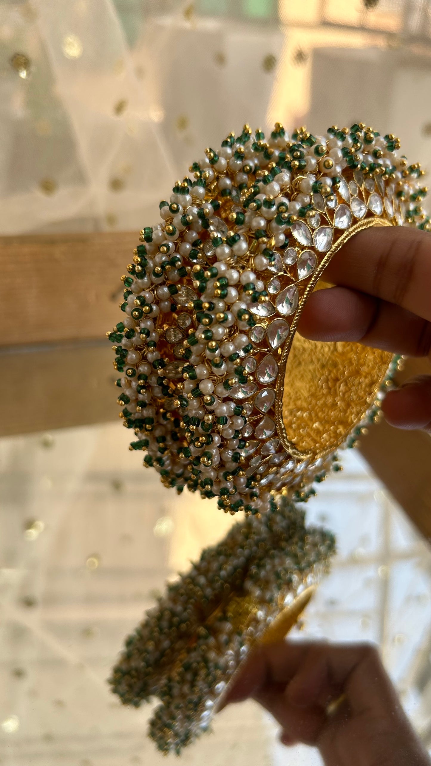 'Nora' Pachi kundan pacheli