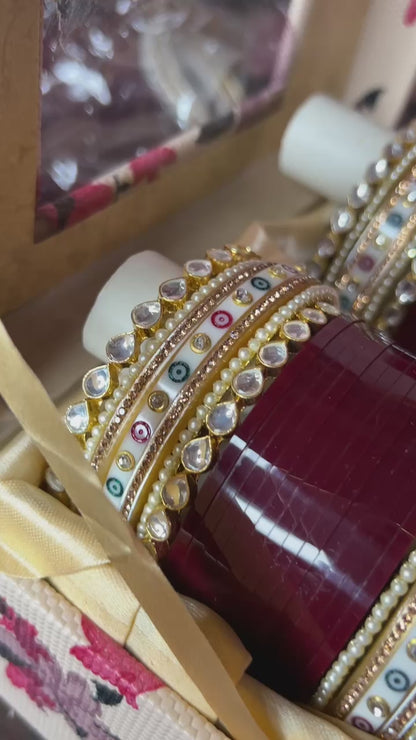 Traditional maroon chooda in pachi kundan