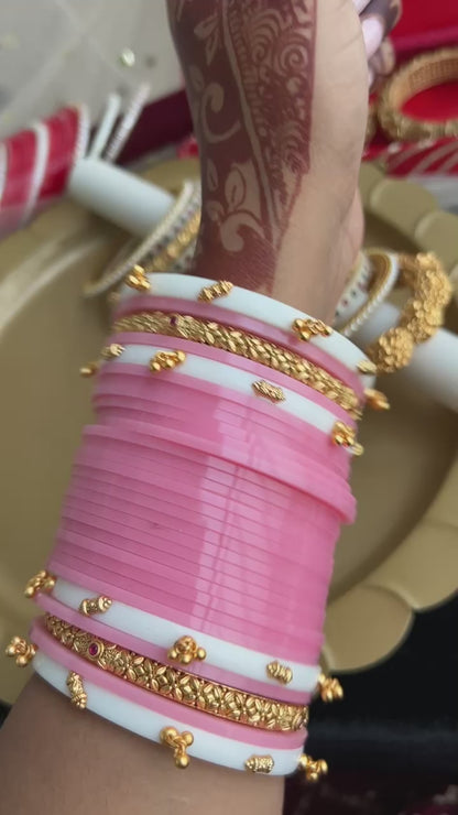Viral Blush pink chooda with golden Accents