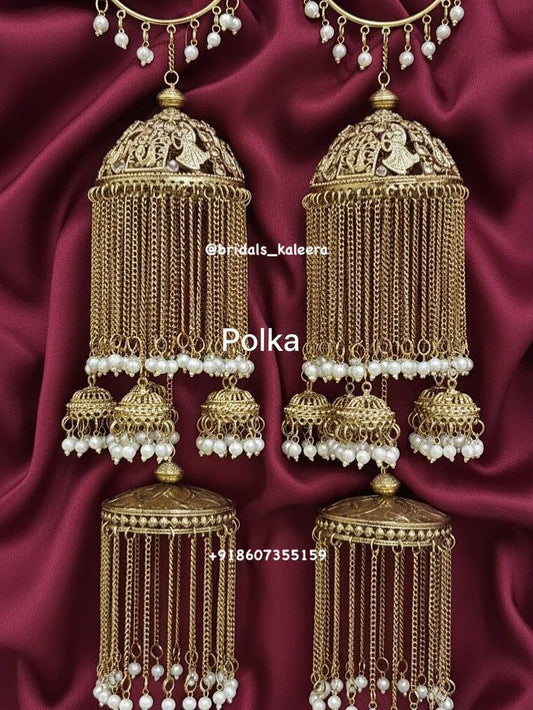 Antique kalira with bride and groom on dome