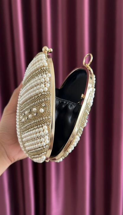 Party hand clutch with bangels handle