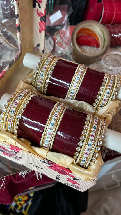 Traditional maroon chooda in pachi kundan